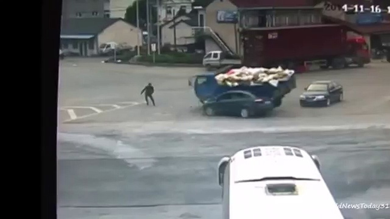 Lorry and car crash at road crossing in China