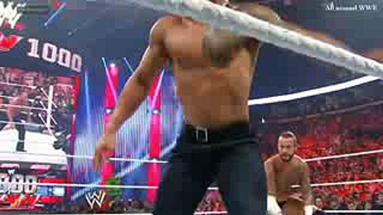 WWE CM Punk gives The Rock a GTS Slow Motion Replay from Raw 1000