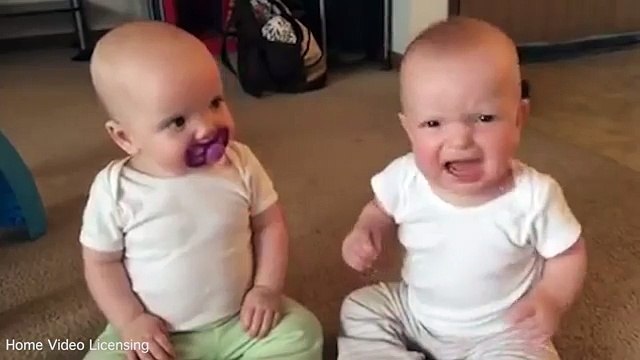 Give it back! Hilarious moment twin babies squabble over dummy _ Daily Mail Online