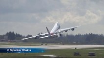 747 Boeing Airplane does goodbye sign with wings taking off