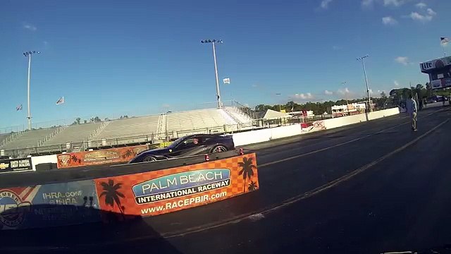 Tesla Model S P85D vs Ferrari F12 14 Mile Drag Racing