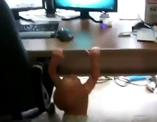 Baby does pull ups trying to watch cartoons