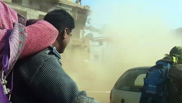 A lane of house bulldozed for Orange train Lahore