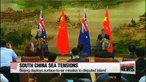 China deploys anti-aircraft missiles to disputed islands, raising tensions