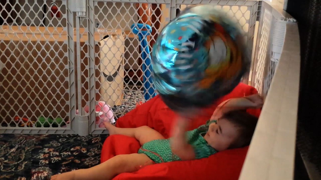 Adorable Baby Giggles At Balloon