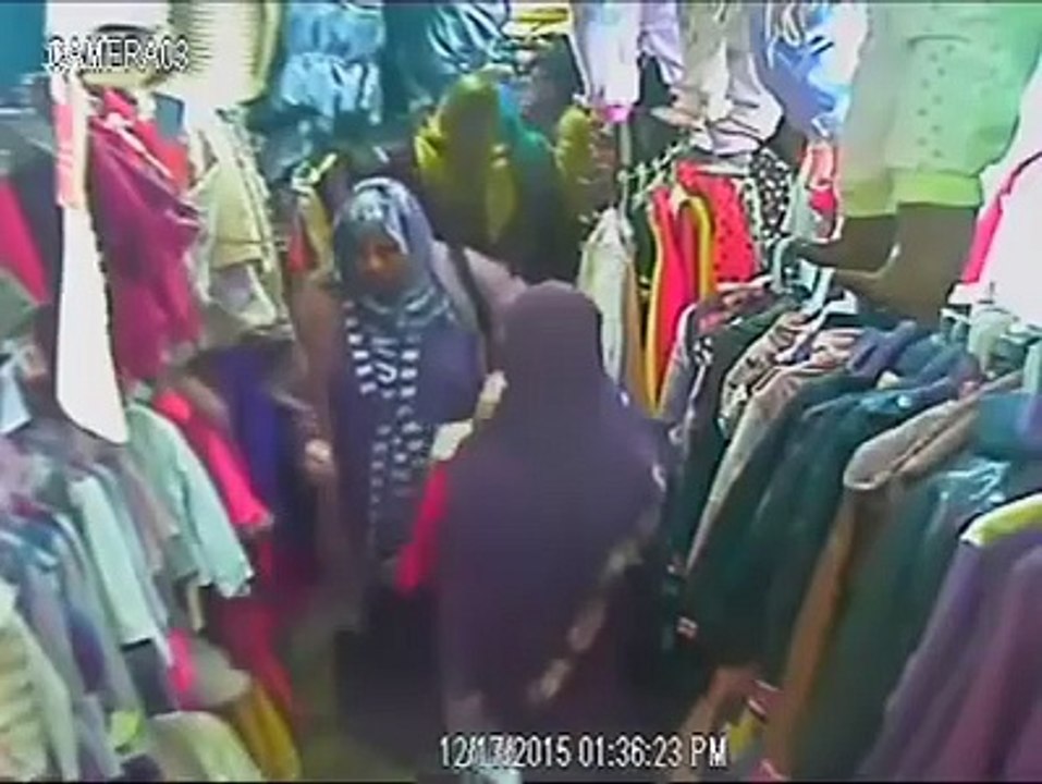 _سيدة تسرق «موبايل» من شنطة أخرى في معرض ملابس بالفيوم__