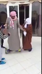 Middle Eastern Guy Has Glass Door Wipeout on Hoverboard