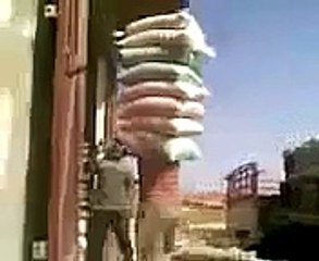 Man Lifts Eight Sacks Load Amazing Video