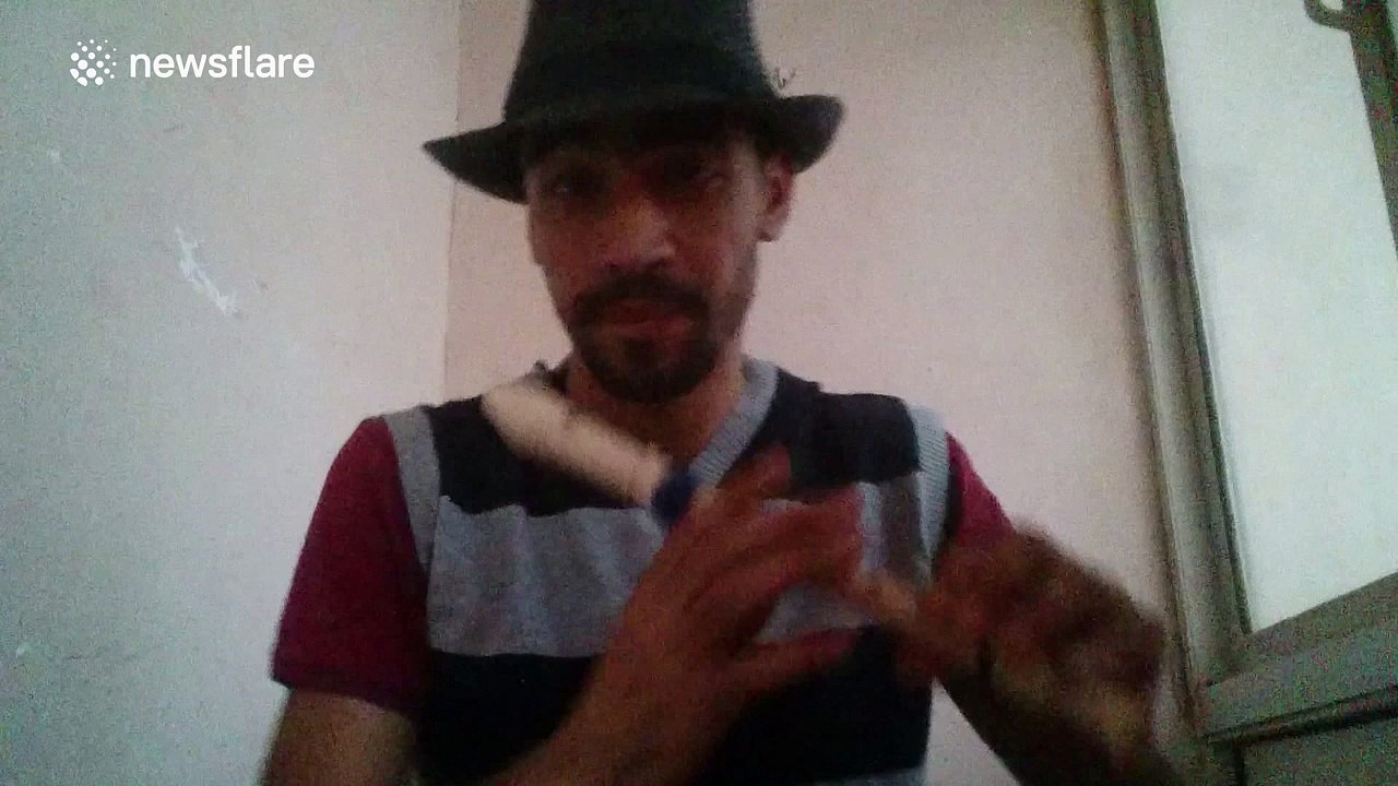 Man freestyle beat boxes while playing the recorder