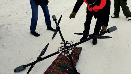 A snowboard pulled by a drone