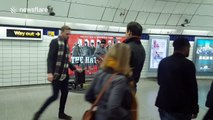Londoners take moment out of tube journey to dance to busker's music