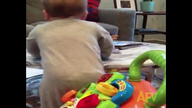Baby Can't Resist Knocking Over the Water