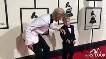 Big Brother Justin Bieber showing Jaxon Bieber the ropes at the 58th GRAMMY Awards