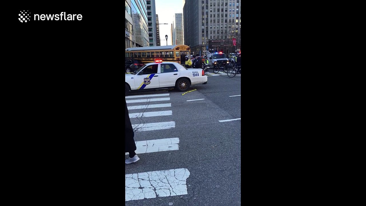 Schoolbus crashes into Philadelphia bank