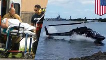 Helicopter crashes near Pearl Harbor, trapping 16-year-old inside