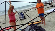 Busted! Two women caught stealing a canopy on the beach_ then attack!