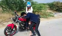 A man with cute girl drive motorbike 2016