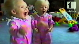 Twin girls play in the wind from a fan - Cute - toddletale