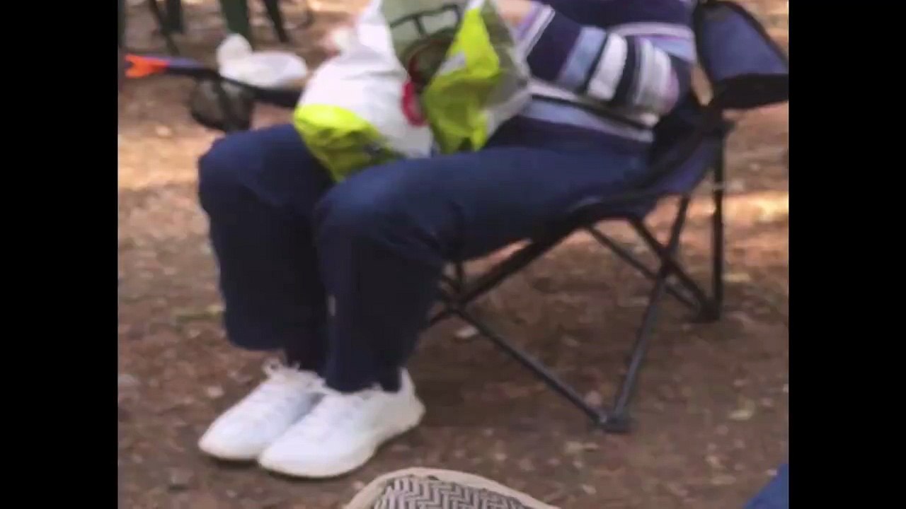 Squirrel Gives Unappreciative Lady A Hug