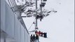 Boy, 11, left dangling off ski lift for SEVEN minutes before plunging 30 feet into rescuers' arms
