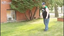 Fat guy attempts to kick football... pops the ball