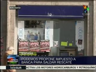 España: PODEMOS propone impuesto a banca para saldar deuda por rescate