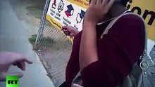 cop wrestles woman to grond