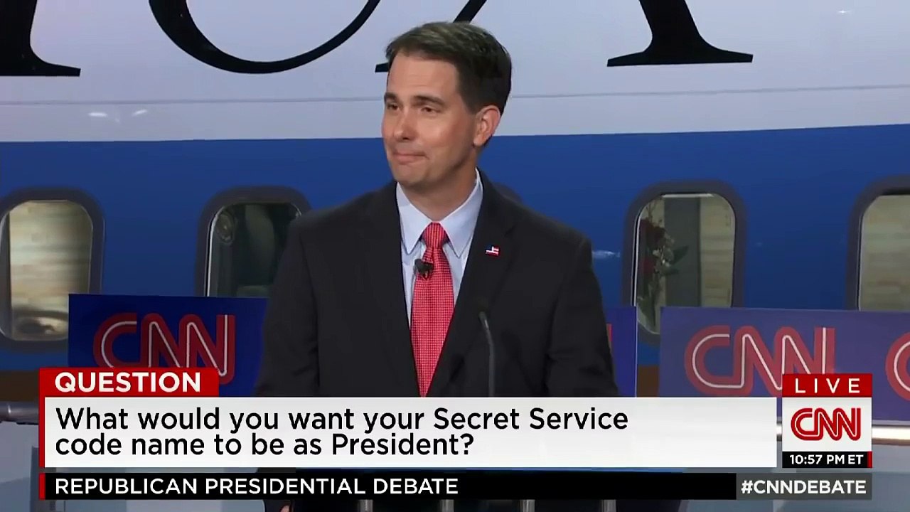 Trump gives Bush a low-five after debate joke