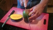 Cutting a mango--easy and fast.Cutting a mango--easy and fast