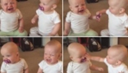 İkizlerin emzik mücadelesi