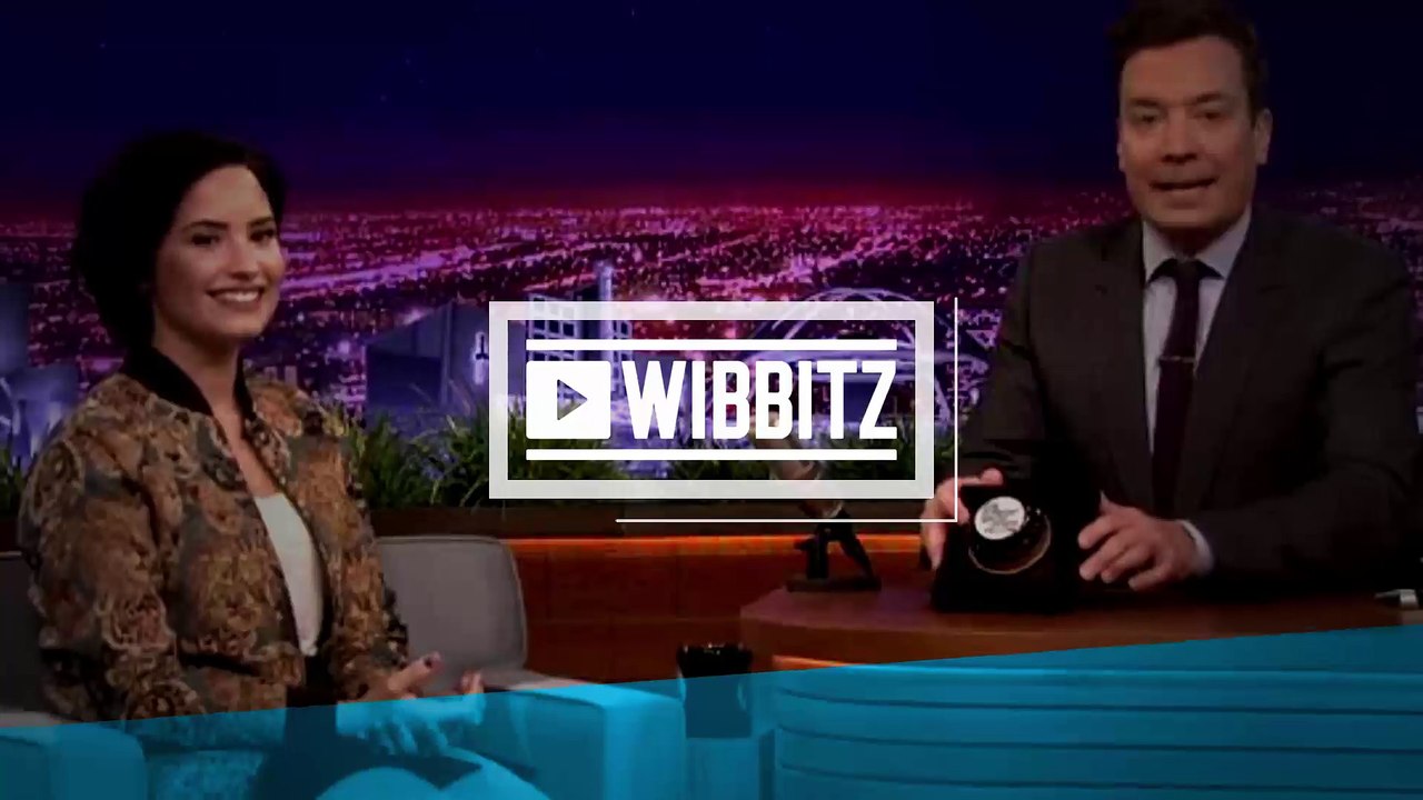 Demi Lovato does impression of pop rival Christina Aguilera on the Tonight Show