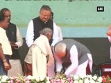 PM Modi touches feet of 104-yr-old woman