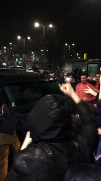 Conor McGregor getting mobbed by fans after leaving a fast food restaurant