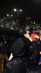 Conor McGregor getting mobbed by fans after leaving a fast food restaurant