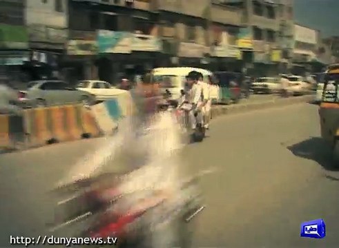 Peshawar traffic police bars motorcyclists from wearing helmets with black shades