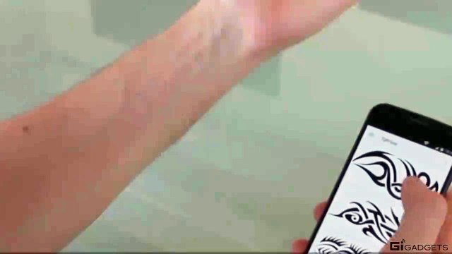 Switch your tattoo anytime you want. This E-ink Tattoo Puts a Tattoo on Your Skin.