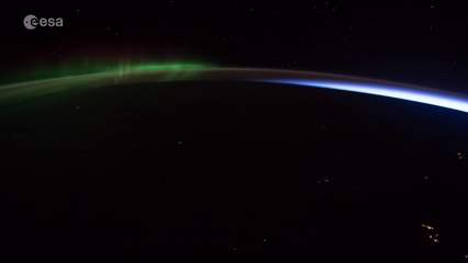 Aurora fleeing the rising Sun