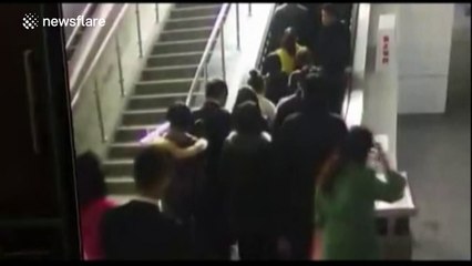 Escalator suddenly changes direction causing dangerous pile-up