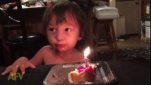 This boy goes to great lengths to blow out his birthday candle.