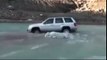 LiveLeak - crossing fail car swept in fast flowing water -