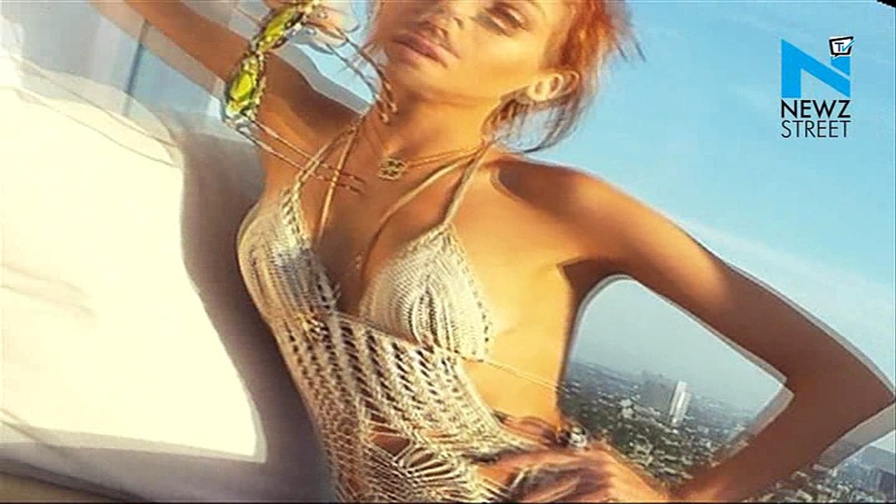 Imogen Anthony drops her top