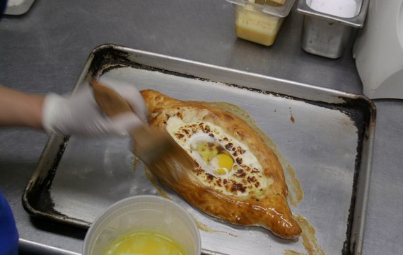 Making The Magical Butter-Filled Cheese Bread That's Better Than Pizza
