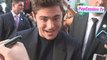 Zac Efron takes selfies while greeting fans at We Are Your Friends Premiere in Hollywood