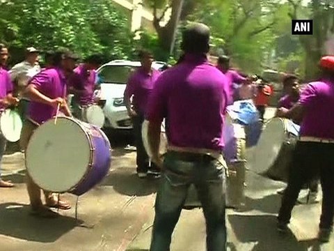 Fans celebrate as Sanjay Dutt reaches his residence in Mumbai
