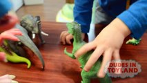 Dinosaur toys fighting and falling by Dudes in Toyland