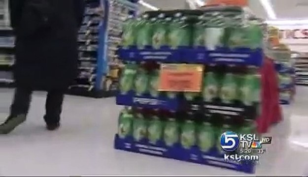 Furry thief , DOG shop lifting, grabs Christmas present out of grocery store aisle
