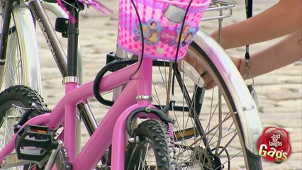 Relax Daily_Big Biker, Tiny Pink Bike, Big Rusty Nail Prank