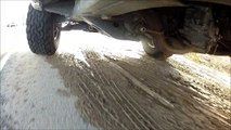 GoPro SLOW MOTION truck tires hit MUD PUDDLE - under truck view