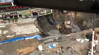 Subway construction site collapses into humongous sinkhole