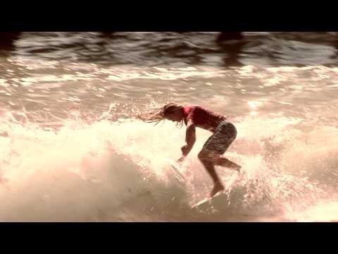 Surfers Hit Some Waves in Style
